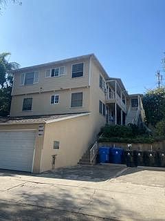 Lovely six unit apartment building, with quiet, and respectful professional tenants. Garage parking for your car with a remote.