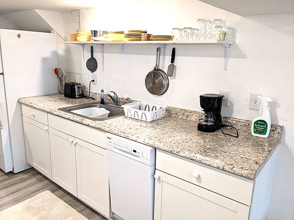 microwave, toaster, coffeepot, kitchen utensils and cookware