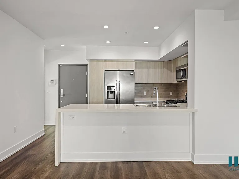 Front Entrance and Kitchen with Countertop Bar