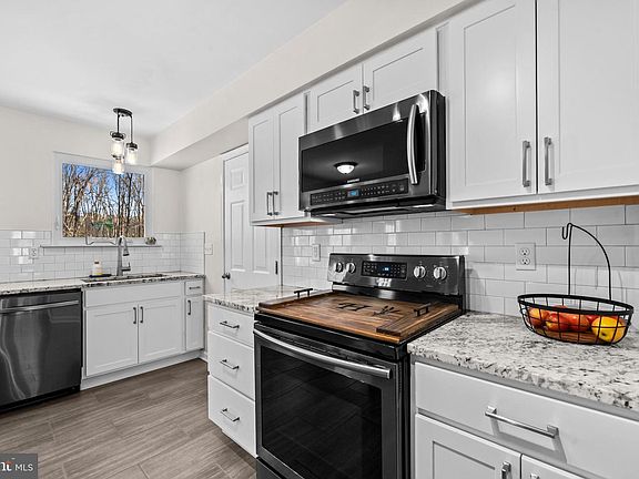 5th image of 8002 Sourwood Ct