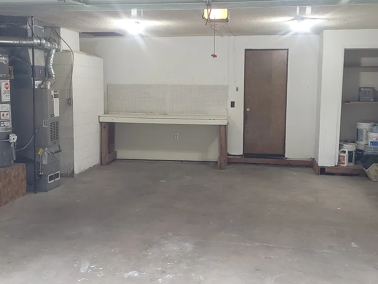 Spacious 2-car garage with workbench