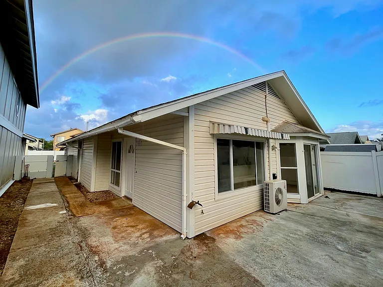 Low maintenance yard, private side entrance front door.