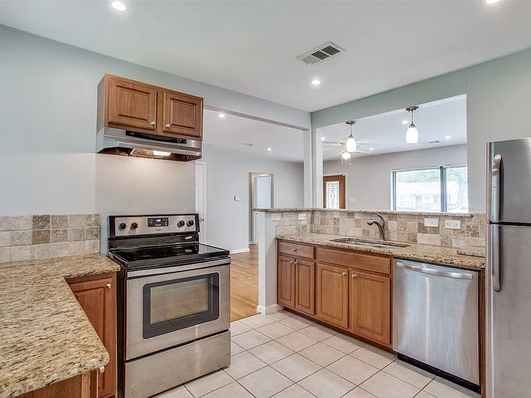 Good storage with dishwasher, electric range and SS fridge included.