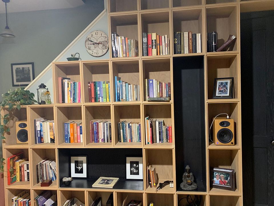 No TV in this house. Oak walls and bookshelves.
