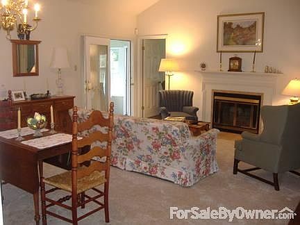 Great room
						:
						See through gas fireplace to adjoining den and lovely chandelier.