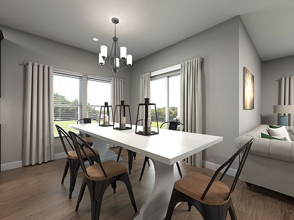 Gather the family for a home-cooked meal in the spacious dining area.