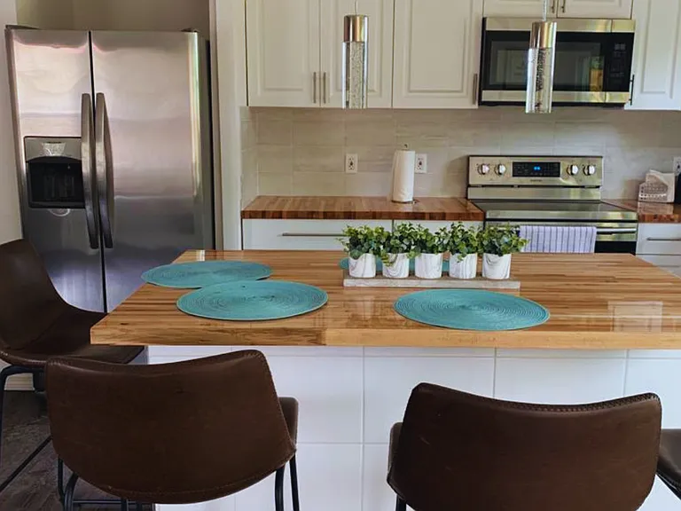 Spacious Kitchen with Oven, Microwave & Coffee Maker.