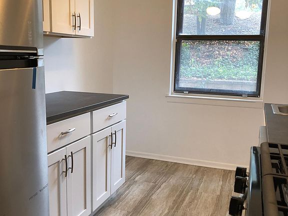 There is room for a table and chairs by the window.