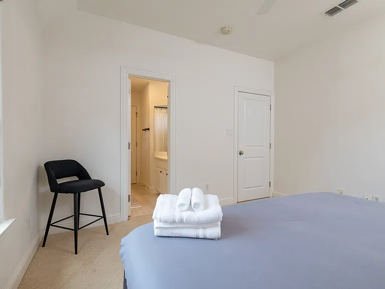 Spacious king suite layout with convenient ensuite bathroom access.