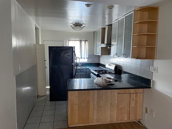 Refrigerator will be moved back into nook.