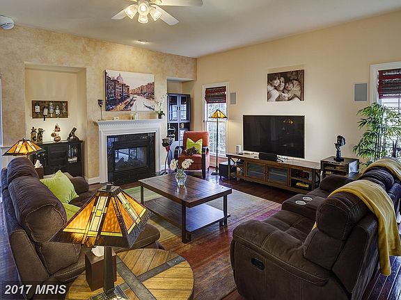 Just off the kitchen, cozy family room w/fireplace