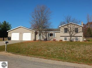 3887 Whispering Oaks Dr, Traverse City, MI 49696