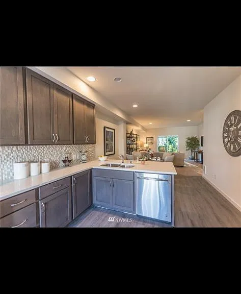 kitchen overlooking the dining room and living room