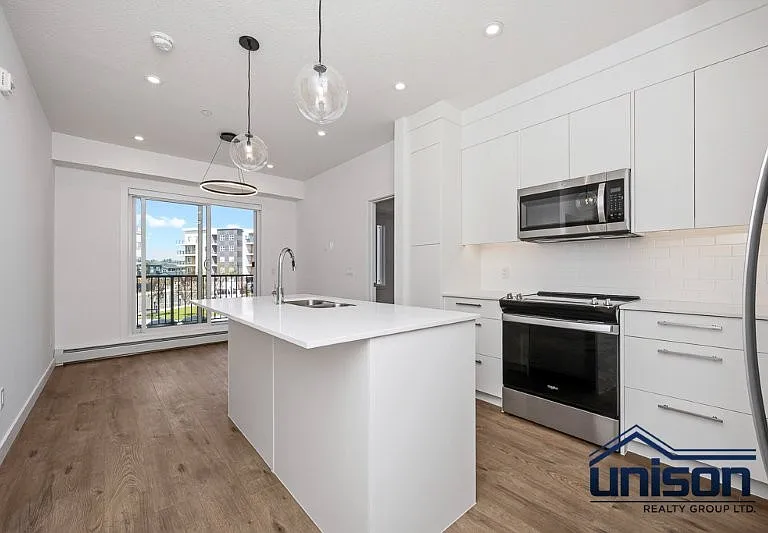 265 Wolf Willow Blvd SE #3205 — Photo 1