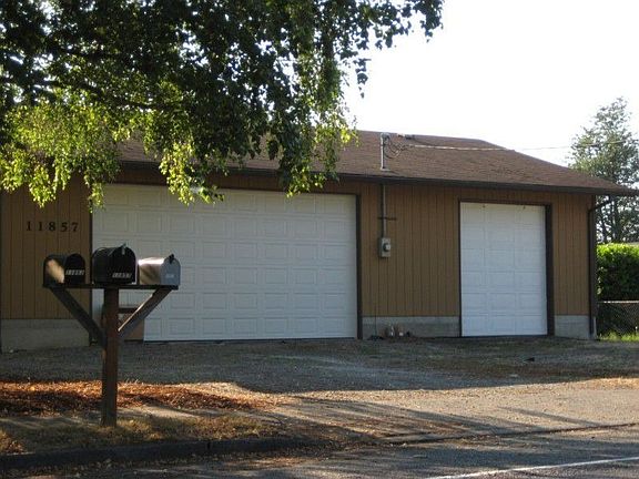 The three-bay garage is pretty terrific!