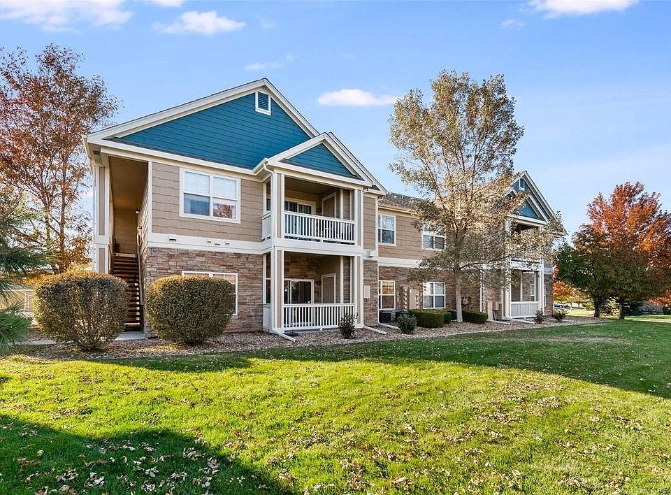 End-unit, main level condo with open space in front of the private balcony/patio