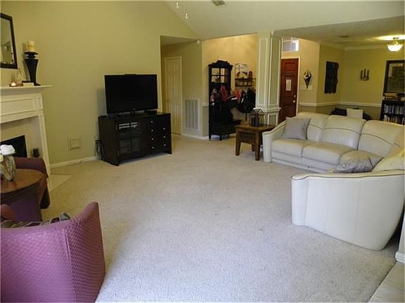 The floor plan is very open and spacious and the owner has added fresh custom paints in neutral tones.