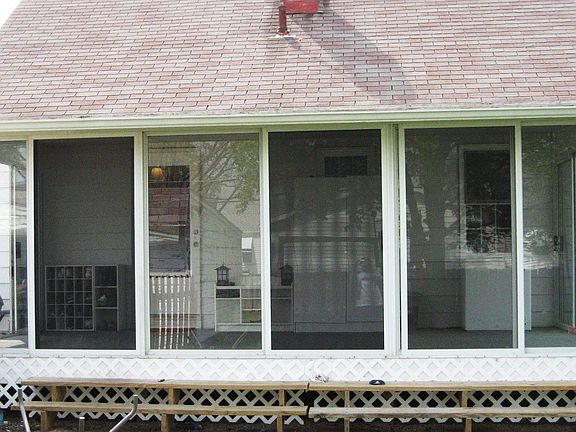 Backyard View of Enclosed Patio
