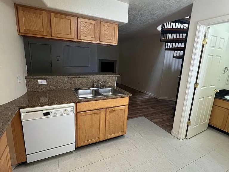 Modern Condo-Style Living Near Nob Hill & UNM $300 Off Move-In Special at The Spirals Apartments — Photo 7