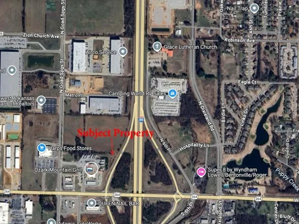 E Monroe Ave, Lowell, AR 72745