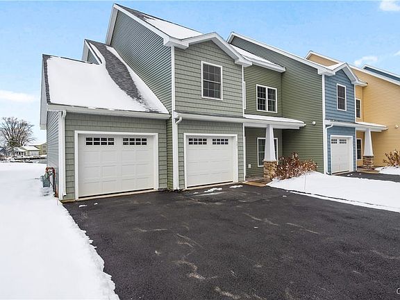 Front view showing the large 2.5 car garage