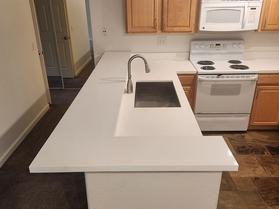 New Quartz countertop, sink and faucet