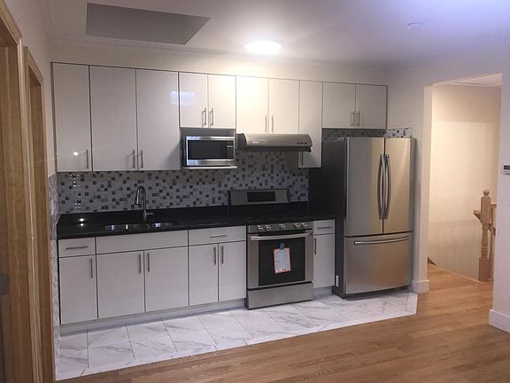 4th image of 5228 73rd St Floor 2