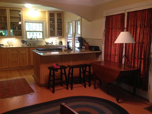 Open floor plan from dining area into kitchen.
