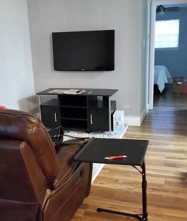 living room, dining room & kitchen to the right