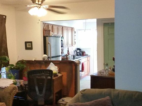 Dining area and kitchen beyond