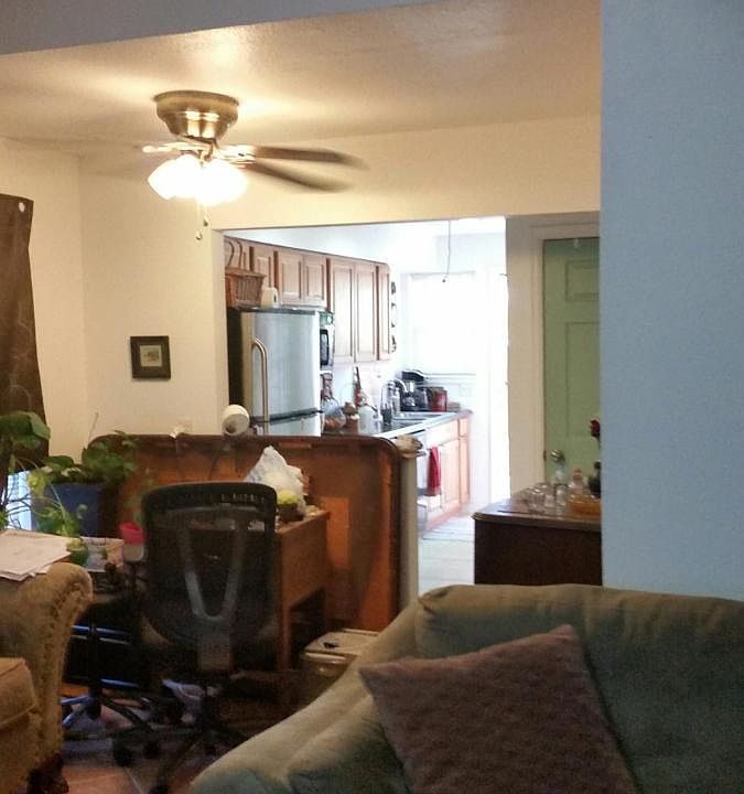 Dining area and kitchen beyond