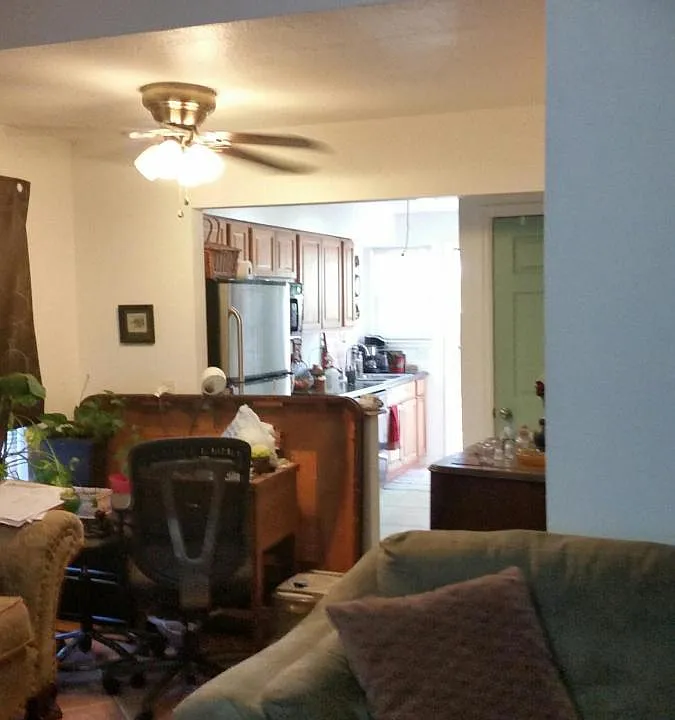 Dining area and kitchen beyond