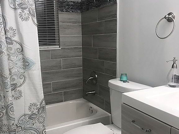 Remodeled stone tub surround