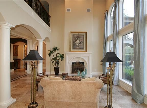 Formal Living Room with Double Sided Fireplace