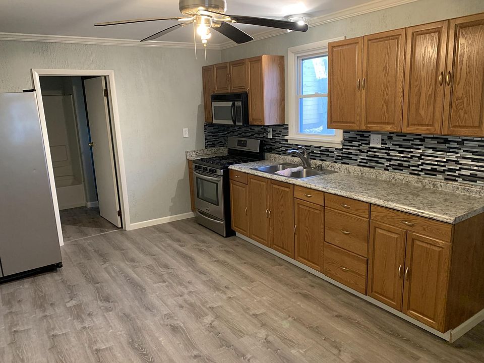 Kitchen looking at bathroom/Laundry Room