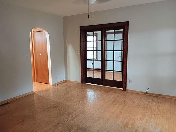 Living room to hallway and half bath