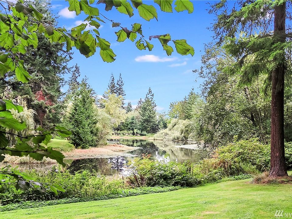 BEAUTIFUL, SERENE LAKE & NATURE VIEWS FROM THIS UPDATED DW MOBILE in the highly desirable Green Acres 55+ Park! Enjoy a calming oasis with all the convenience of city living nearby!