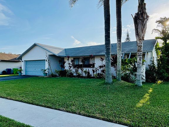 2 Car Garage and Plenty of Driveway Parking