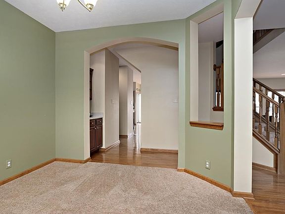 Open Formal Dining area with built in serving center off back hall.