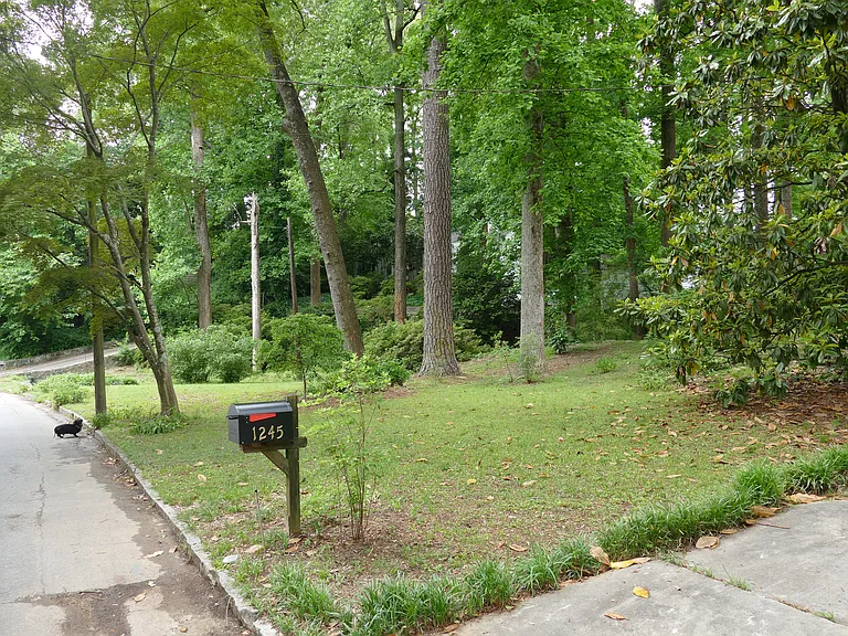 .5 Acre Lot with large frontage. Quiet street great for walkers.