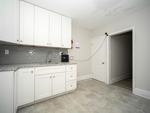 Kitchen includes stove and Fridge