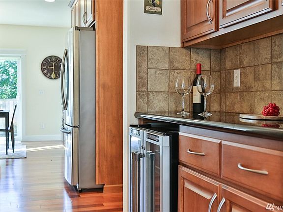 Butler's pantry includes expansive pantry storage and a wine/beverage cooler.