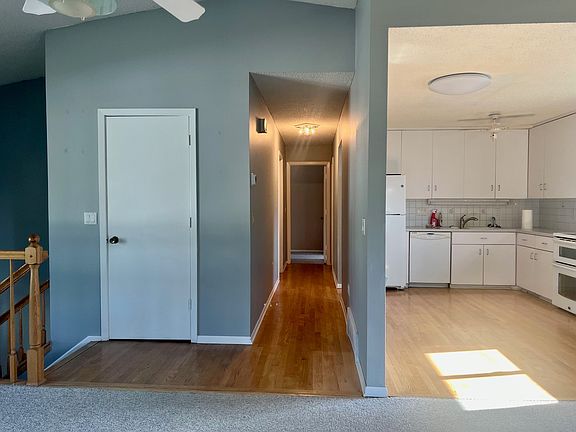 View of the kitchen and hallway from the family room