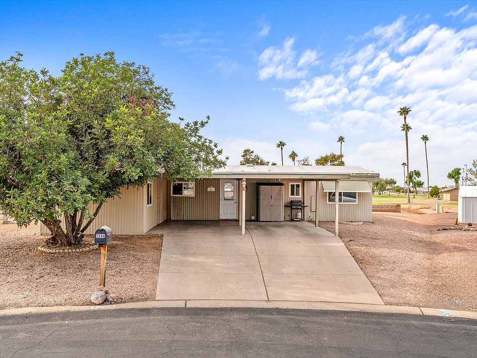 Main entrance off of double carport.