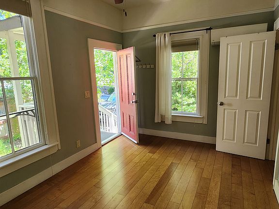 Bedroom, back door to small porch.