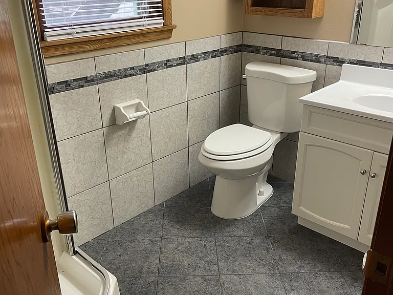 Lower bathroom with shower.