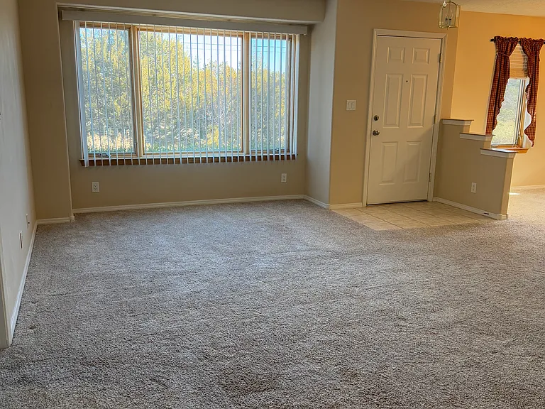 Living room view to front door