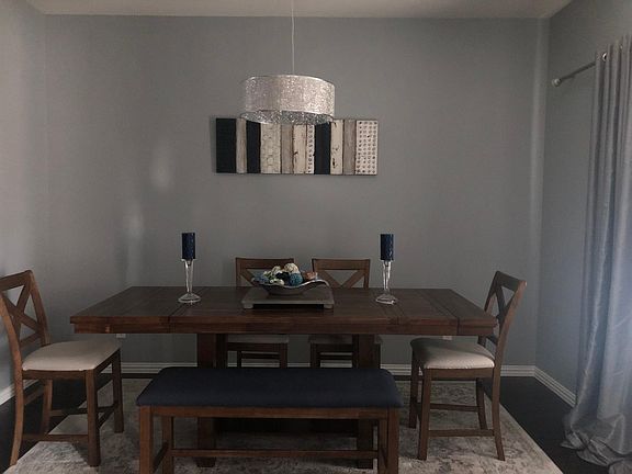 Large formal dining space to the right upon entering front door