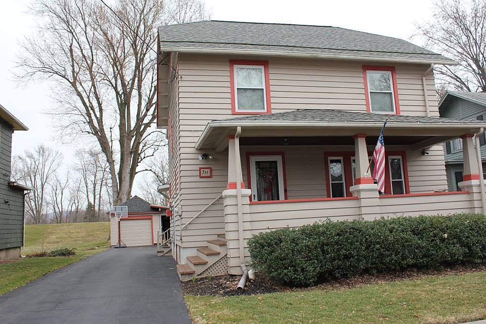 front view, paved driveway