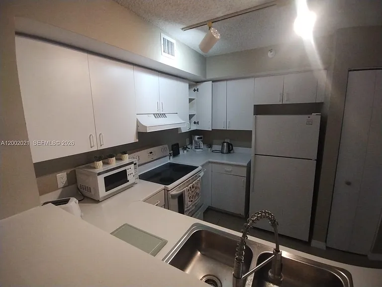 111 Yacht Club Way #107 — Photo 16